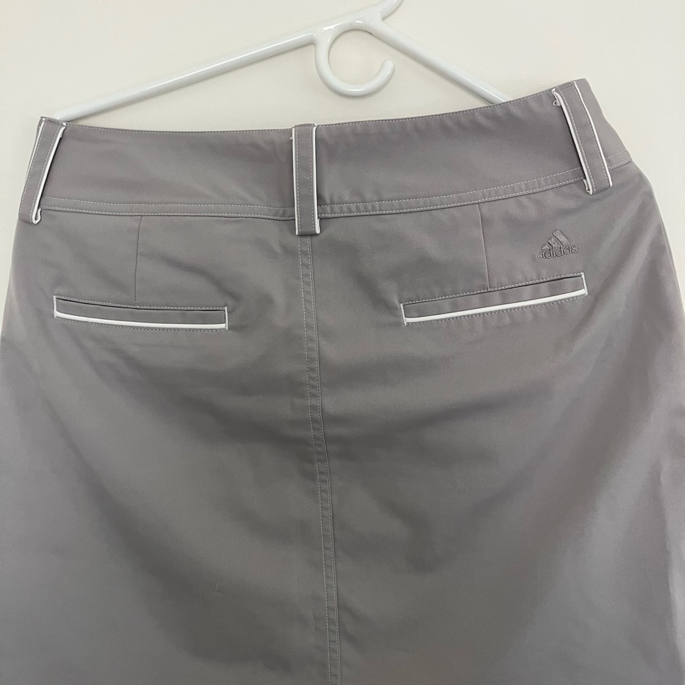 Adidas climactic light grey with white trim detail, golf skirt size 6.